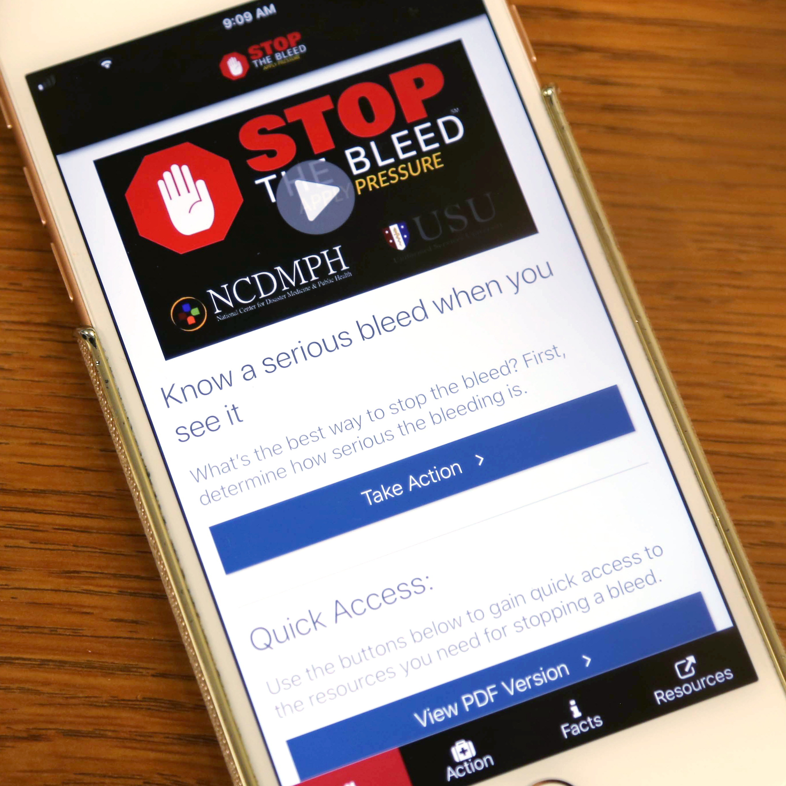 Photo of a cell phone with the Stop the Bleed app on the display.